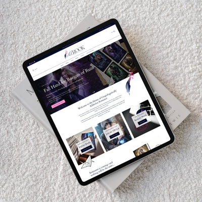 Tablet displaying A.L.Rook author branding on a textured surface