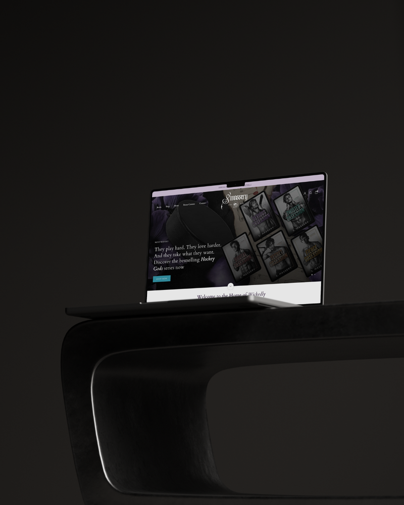Laptop on a dark surface with a dark screen
